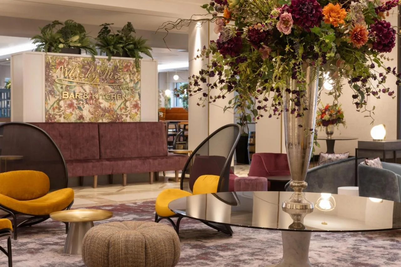 Lobby table with flowers at Hilton Glasgow, Glasgow